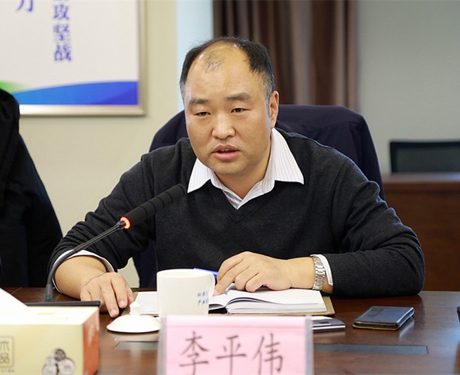熊良虎会见西安市城管局局长李平伟