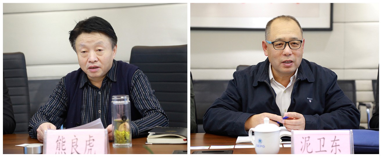 熊良虎会见中建材（北京）环保公司董事长泥卫东